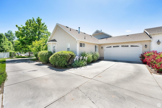 799 E 10 S, American Fork, UT 84003 - view of front of home featuring concrete driveway, an attached garage, and a shingled roof