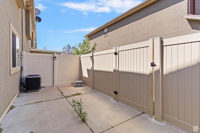 3119 N Whitetail Dr Unit 85, Layton, UT 84040 - view of patio / terrace featuring a gate