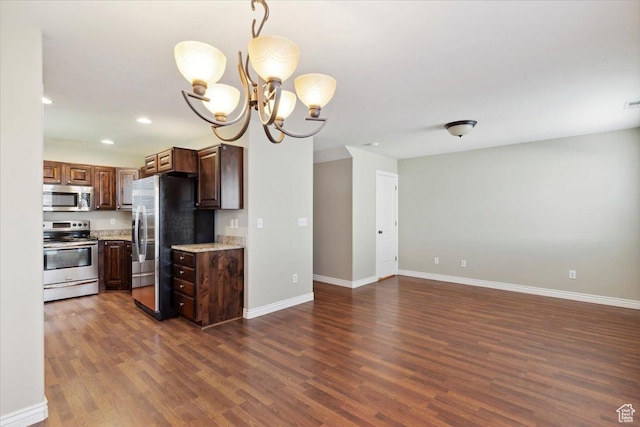 3119 N Whitetail Dr Unit 85, Layton, UT 84040 - kitchen with appliances with stainless steel finishes, recessed lighting, dark wood-type flooring, a chandelier, and open floor plan