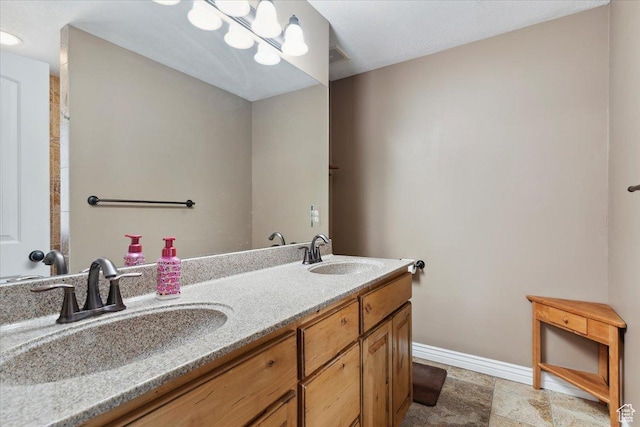 3146 N 750 W, Pleasant View, UT 84414 - bathroom featuring double vanity and baseboards