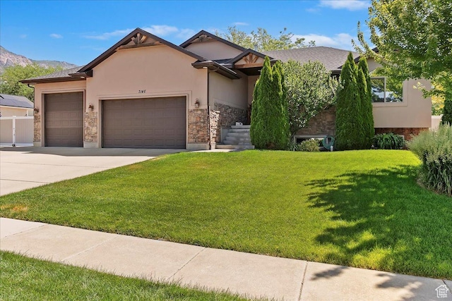 3146 N 750 W, Pleasant View, UT 84414 - view of front of home with stone siding, an attached garage, stucco siding, and driveway