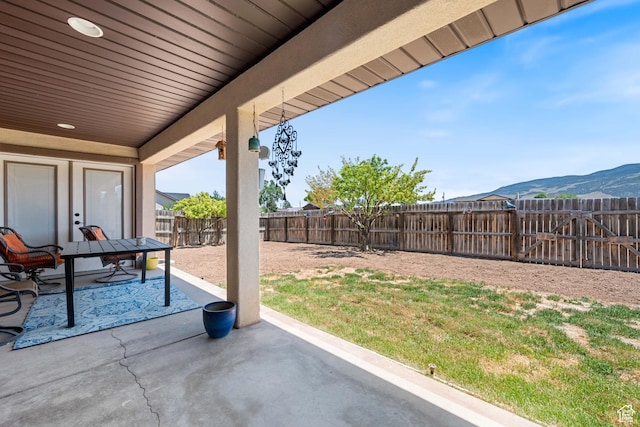 3712 N 250 E, Enoch, UT 84721 - fenced backyard featuring a patio and a mountain view