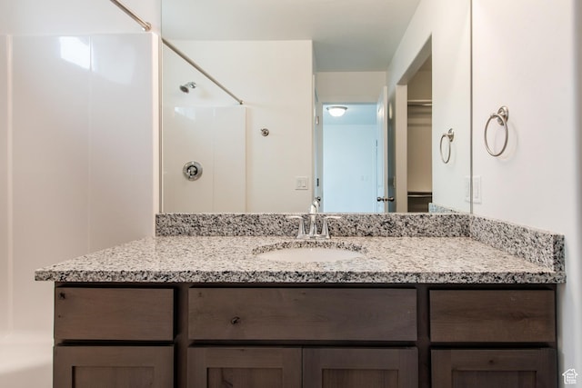 1170 W High Plains Dr Unit 609, Grantsville, UT 84029 - bathroom featuring vanity and a shower