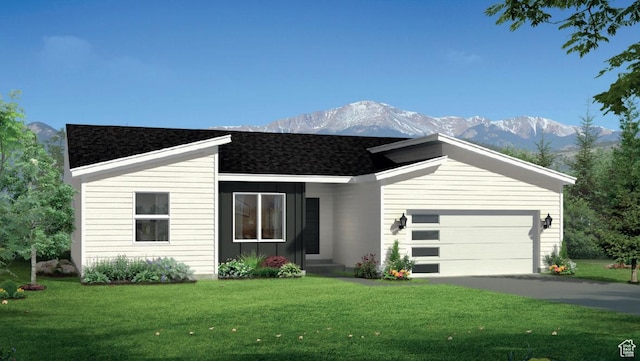 1170 W High Plains Dr Unit 609, Grantsville, UT 84029 - view of front of home with a front lawn, a mountain view, driveway, a garage, and roof with shingles