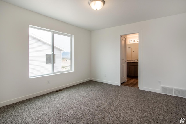1170 W High Plains Dr Unit 609, Grantsville, UT 84029 - unfurnished room featuring carpet floors and baseboards
