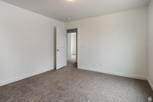 1170 W High Plains Dr Unit 609, Grantsville, UT 84029 - empty room with carpet floors and baseboards