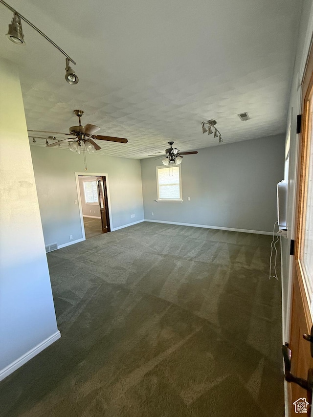 1885 S 50 W, Bountiful, UT 84010 - carpeted spare room featuring track lighting, a ceiling fan, and plenty of natural light