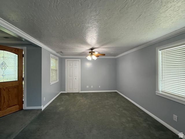 1885 S 50 W, Bountiful, UT 84010 - foyer with ceiling fan, a textured ceiling, dark colored carpet, and crown molding