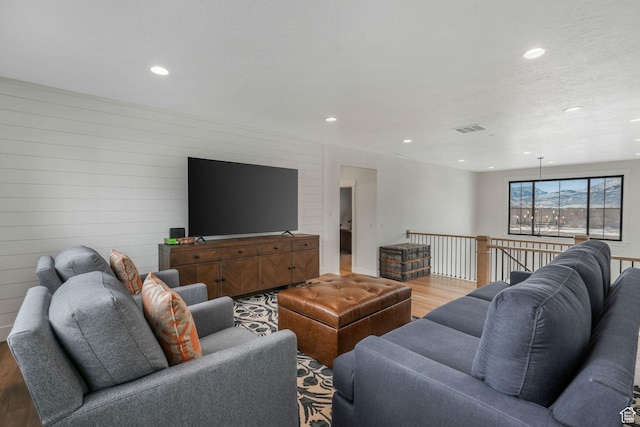 330 N Haystack Mountain Dr, Heber City, UT 84032 - living room featuring light wood-style flooring, recessed lighting, and wooden walls