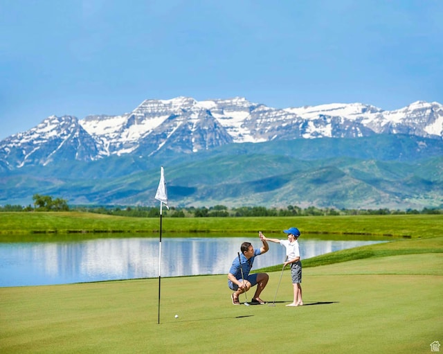 330 N Haystack Mountain Dr, Heber City, UT 84032 - view of home's community featuring a water and mountain view and a lawn