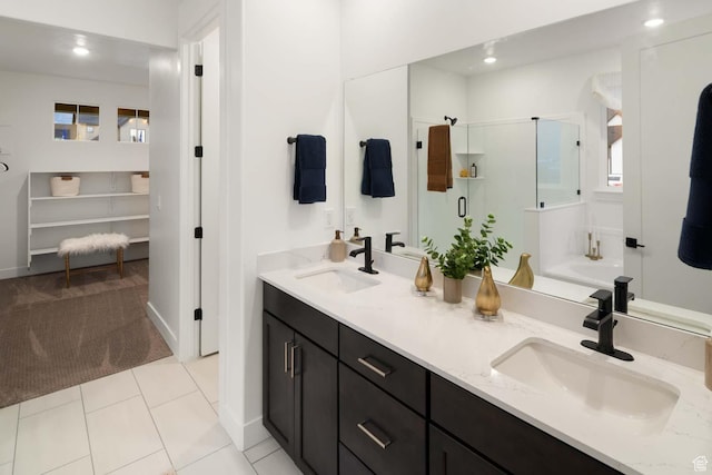 1587 E 820 N Unit 108, Salem, UT 84653 - bathroom with a stall shower, double vanity, recessed lighting, a bath, and tile patterned floors
