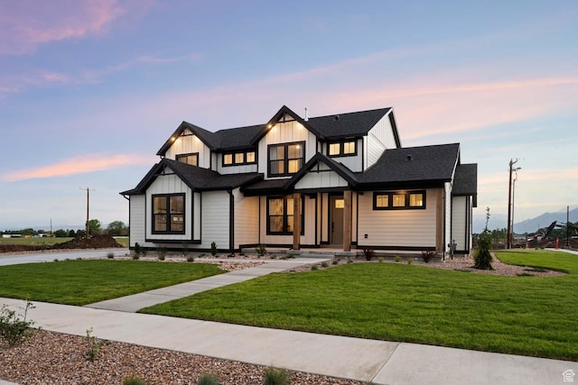 1587 E 820 N Unit 108, Salem, UT 84653 - modern farmhouse style home with board and batten siding, a front yard, and covered porch