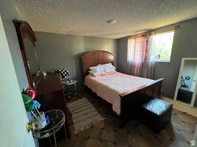 125 E 6940 S, Midvale, UT 84047 - bedroom featuring a textured ceiling