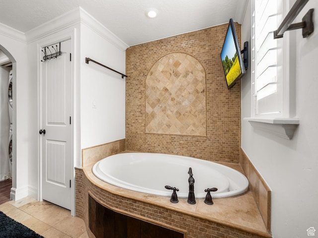 3228 N Brook Ln W, Provo, UT 84604 - full bath with stacked washer and clothes dryer, a bath, and ornamental molding