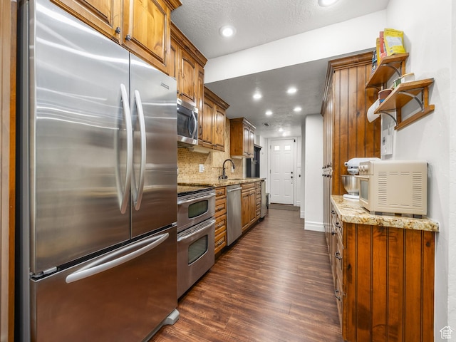 3228 N Brook Ln W, Provo, UT 84604 - kitchen featuring stainless steel appliances, dark wood-type flooring, light stone countertops, backsplash, and open shelves