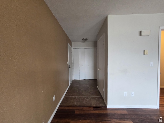 4480 S Atherton Dr Unit 22, Taylorsville, UT 84123 - hall featuring wood finished floors and baseboards