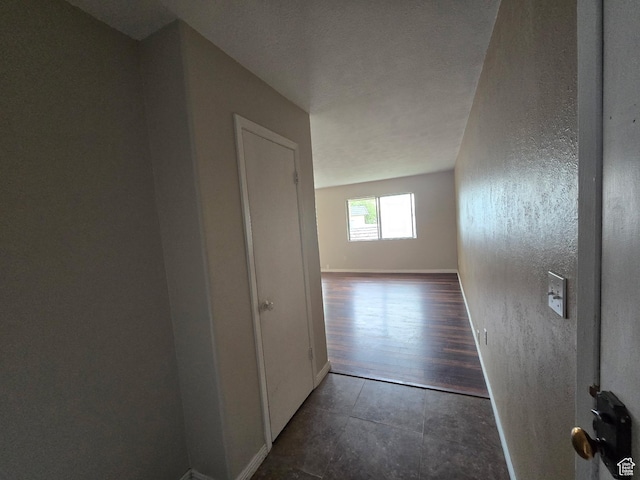 4480 S Atherton Dr Unit 22, Taylorsville, UT 84123 - hallway featuring baseboards and tile patterned floors