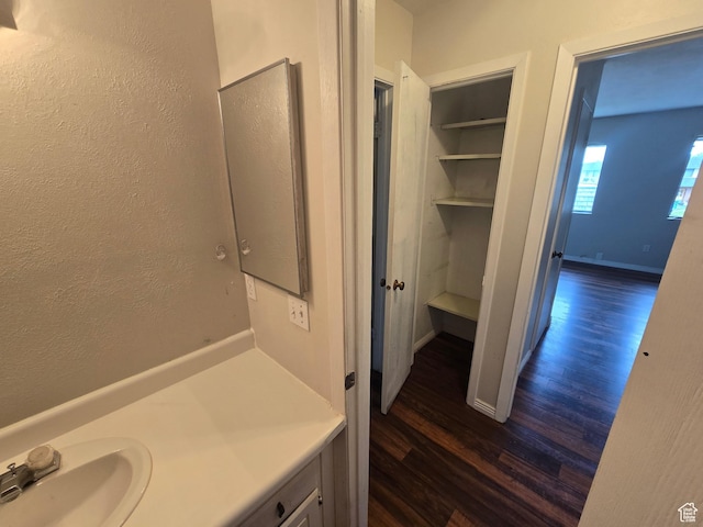 4480 S Atherton Dr Unit 22, Taylorsville, UT 84123 - bathroom featuring wood finished floors and vanity