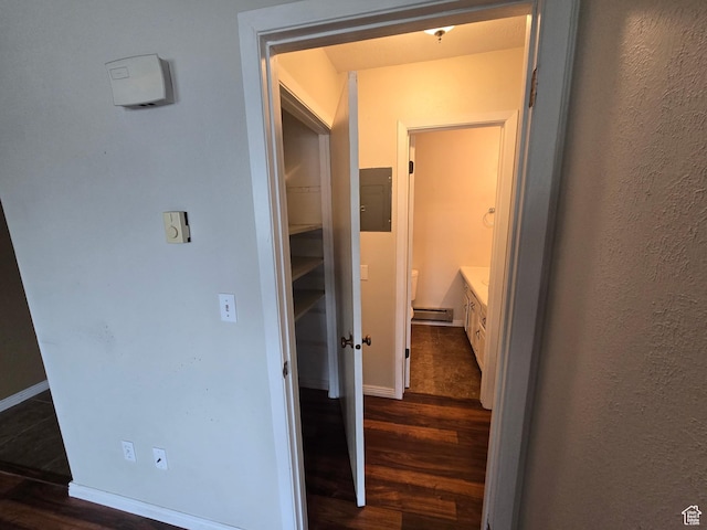 4480 S Atherton Dr Unit 22, Taylorsville, UT 84123 - hall featuring dark wood-style floors, a baseboard heating unit, and electric panel