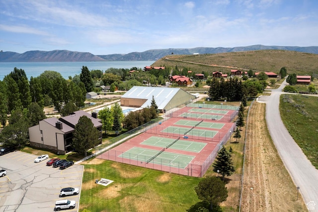 2176 S Bear Blvd # 421, Garden City, UT 84028 - drone / aerial view of a water and mountain view