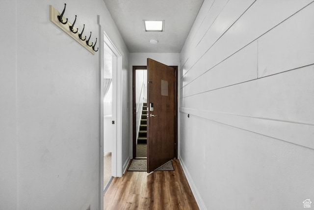 2176 S Bear Blvd # 421, Garden City, UT 84028 - doorway with wood finished floors and baseboards