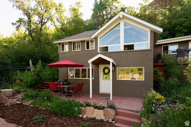 1155 N Pinecrest Canyon Rd, Salt Lake City, UT 84108 - view of front of home with stucco siding and a patio