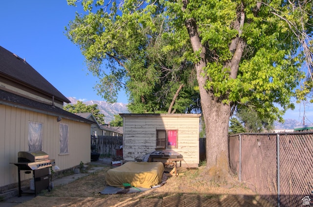 59 S S 400 E, American Fork, UT 84003 - fenced backyard with a mountain view and a storage unit