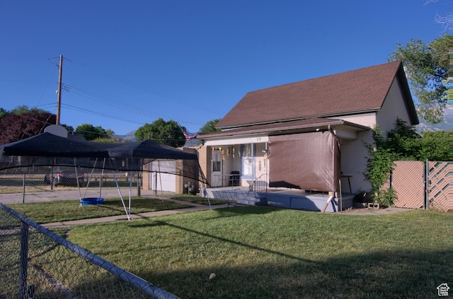 59 S S 400 E, American Fork, UT 84003 - rear view of property with stucco siding and a shingled roof