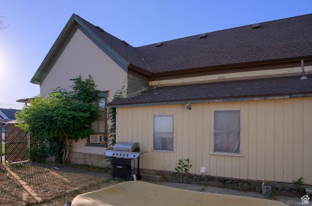 59 S S 400 E, American Fork, UT 84003 - view of home's exterior with a shingled roof