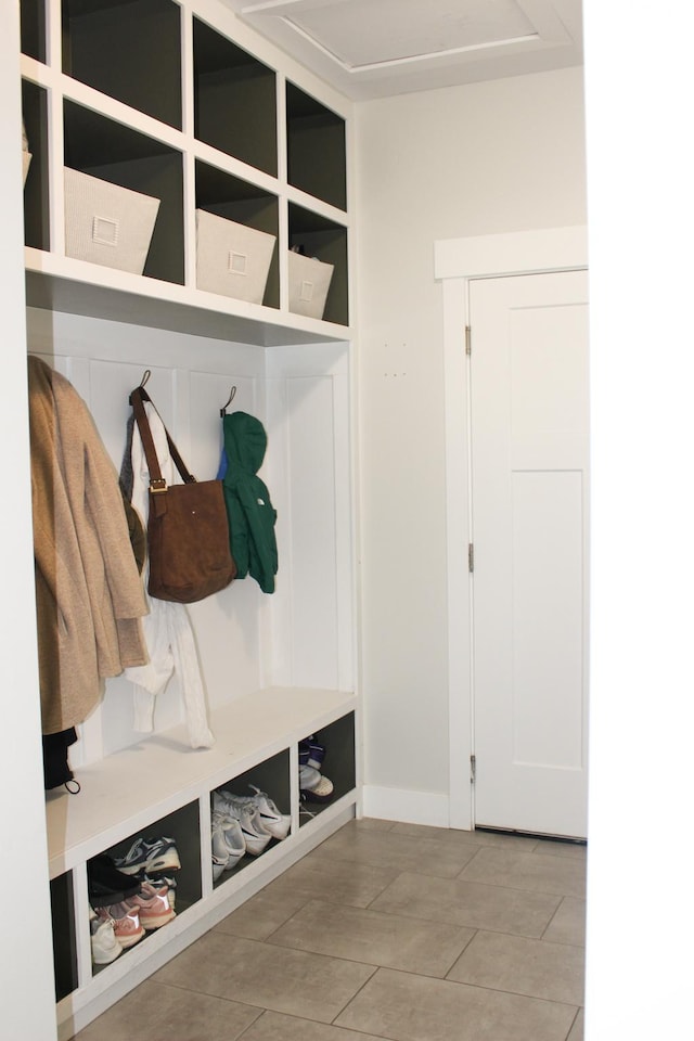 13693 S Blayde Dr, Herriman, UT 84096 - mudroom featuring light tile patterned floors and baseboards
