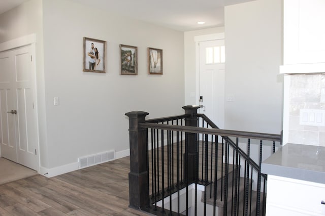 13693 S Blayde Dr, Herriman, UT 84096 - corridor with an upstairs landing, wood finished floors, and recessed lighting
