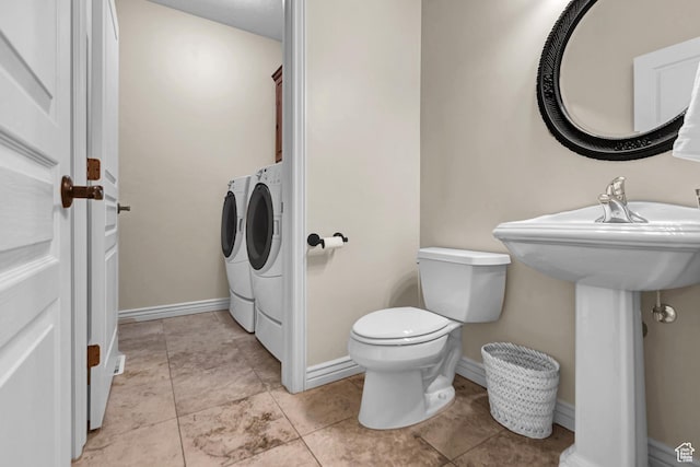285 E Brayden Way, Draper, UT 84020 - bathroom featuring separate washer and dryer and tile patterned floors