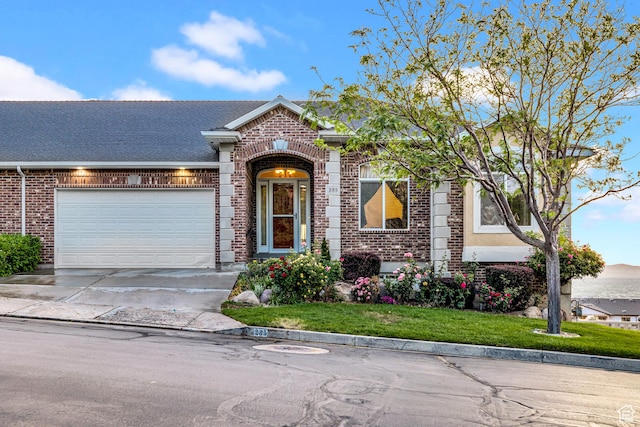 285 E Brayden Way, Draper, UT 84020 - view of front of property featuring brick siding, driveway, a garage, and a front lawn