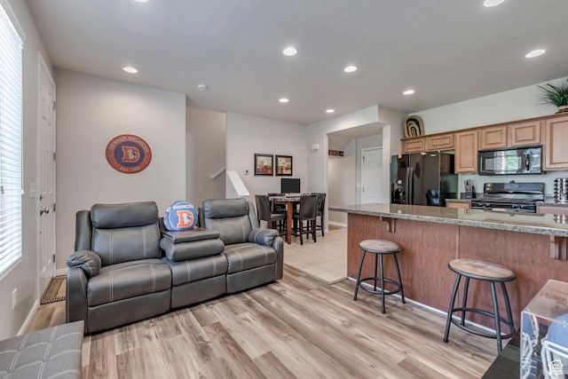 5436 W Brentford Ct, West Valley City, UT 84120 - living room featuring recessed lighting and light wood finished floors