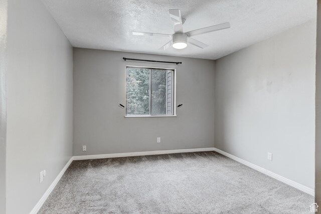 4831 E Emigration Canyon Rd, Salt Lake City, UT 84108 - carpeted empty room featuring a textured ceiling and ceiling fan
