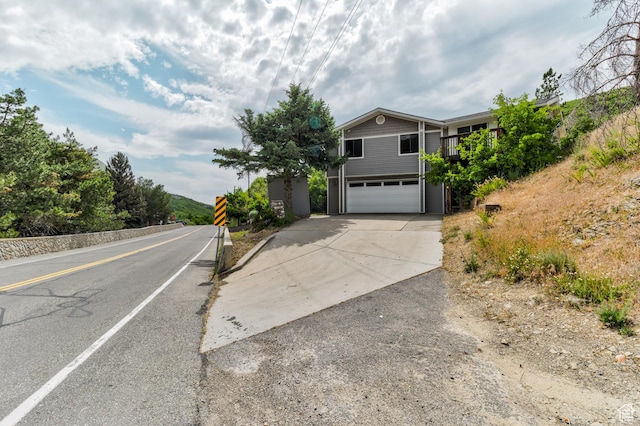 4831 E Emigration Canyon Rd, Salt Lake City, UT 84108 - view of front of property with a garage and driveway