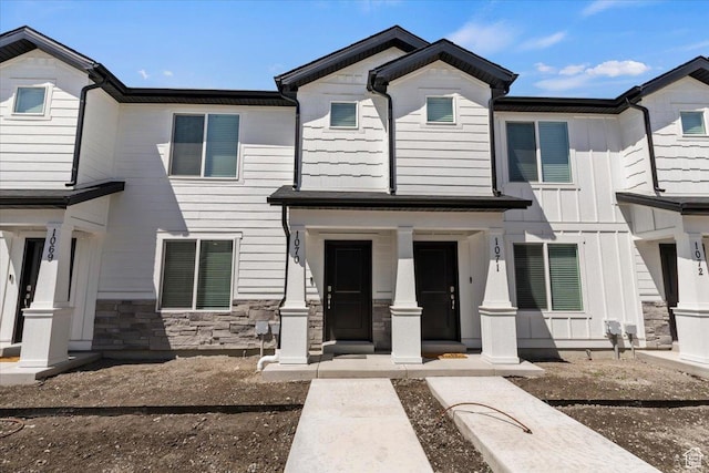 661 W 1920 S Unit 1070, Provo, UT 84601 - view of front of property with covered porch, stone siding, and board and batten siding