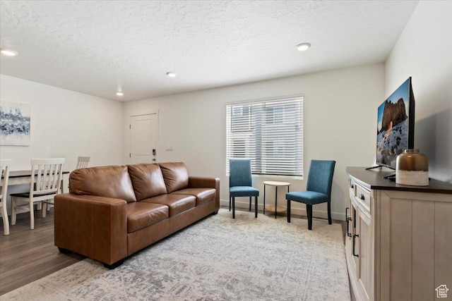 661 W 1920 S Unit 1070, Provo, UT 84601 - living room with a textured ceiling, recessed lighting, and light wood-style floors