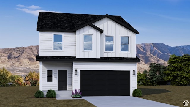 2372 E Woodbury Ln Unit 549, Eagle Mountain, UT 84005 - modern farmhouse style home with board and batten siding, a mountain view, concrete driveway, an attached garage, and roof with shingles