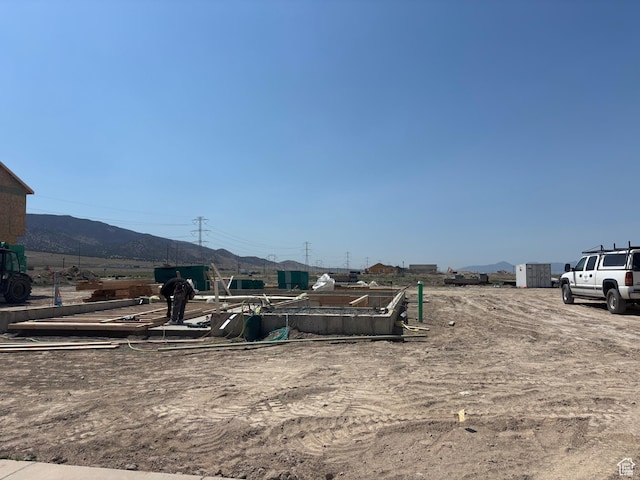 2372 E Woodbury Ln Unit 549, Eagle Mountain, UT 84005 - view of yard featuring a mountain view