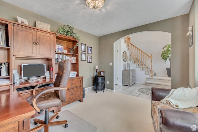 5149 W Rendezvous, Mountain Green, UT 84050 - office with arched walkways, a textured ceiling, and light tile patterned floors