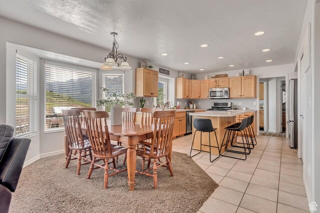 5149 W Rendezvous, Mountain Green, UT 84050 - dining room featuring recessed lighting and light tile patterned flooring
