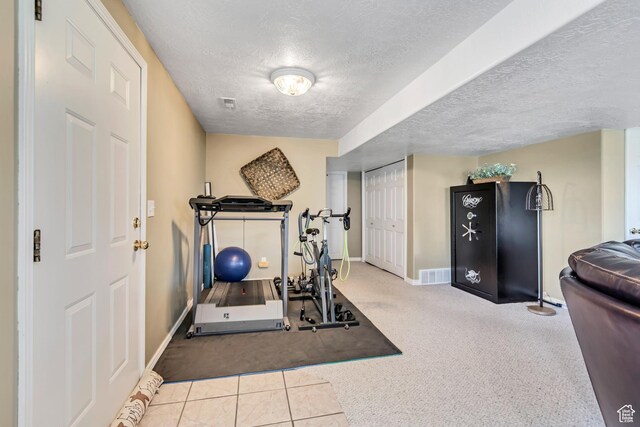 5149 W Rendezvous, Mountain Green, UT 84050 - workout room with a textured ceiling and carpet floors