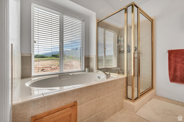 5149 W Rendezvous, Mountain Green, UT 84050 - full bath featuring a stall shower, a garden tub, and tile patterned flooring