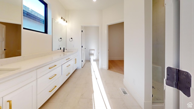 683 N Heritage St, Mapleton, UT 84664 - bathroom featuring double vanity and toilet