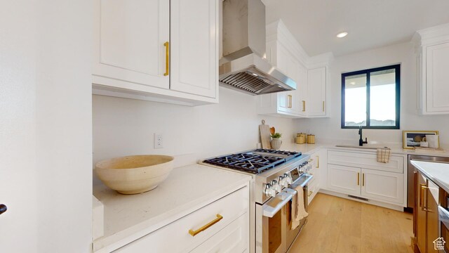 683 N Heritage St, Mapleton, UT 84664 - kitchen with ventilation hood, double oven range, light countertops, white cabinetry, and recessed lighting