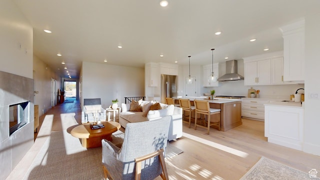 683 N Heritage St, Mapleton, UT 84664 - living room with recessed lighting and light wood finished floors