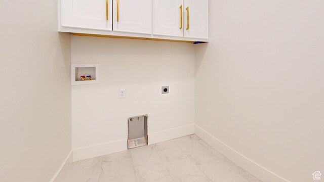 683 N Heritage St, Mapleton, UT 84664 - laundry area featuring cabinet space, hookup for an electric dryer, light marble finish floors, and hookup for a washing machine