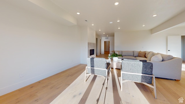 683 N Heritage St, Mapleton, UT 84664 - dining room with light wood-type flooring, recessed lighting, and a high end fireplace