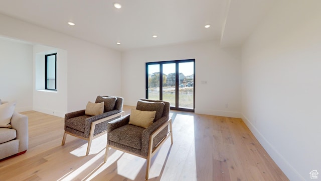 683 N Heritage St, Mapleton, UT 84664 - living area with light wood finished floors and recessed lighting